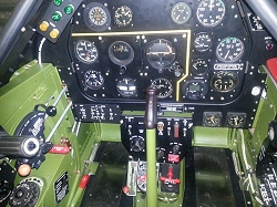 The perfectly refurbished main instrument panel in the cockpit of our P-51D Mustang. 