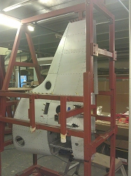 The fin and rear fuselage in a jig.